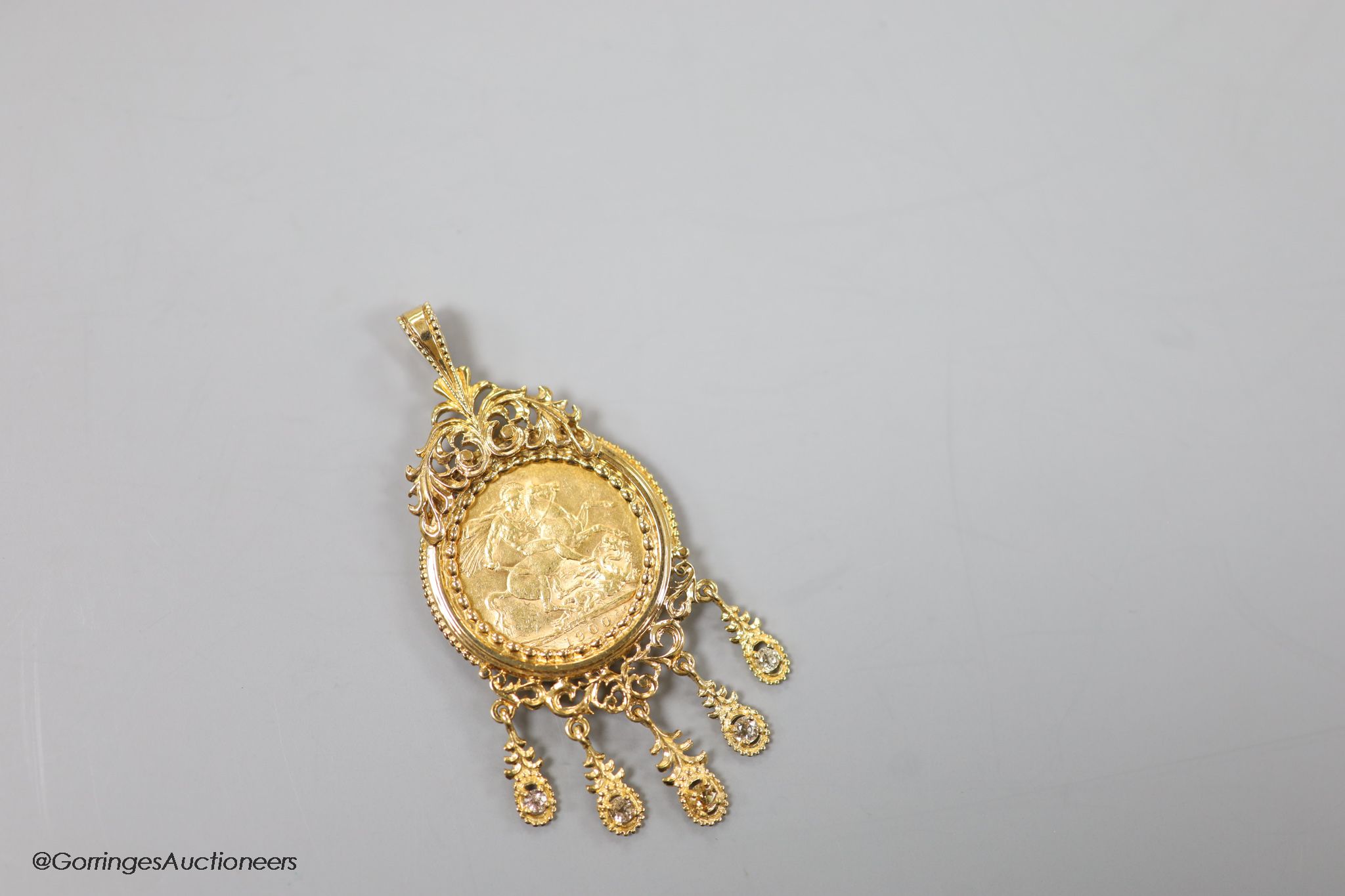 A Victoria 1900 gold sovereign, in a modern 9ct gold pendant tassel drop mount, gross 18 grams.